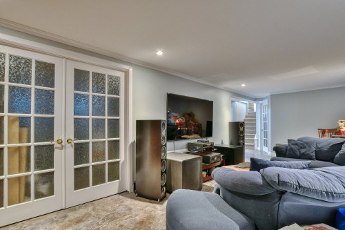Salle familiale - 115 1Re Avenue, Saint-Eustache, QC - Indoor Photo Showing Living Room