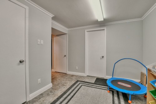 Salle de jeux - 115 1Re Avenue, Saint-Eustache, QC - Indoor Photo Showing Other Room