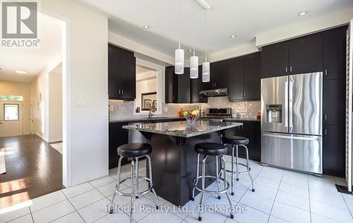 Kitchen Feature Breakfast Bar - 954 Penson Crescent, Milton, ON - Indoor Photo Showing Kitchen With Stainless Steel Kitchen With Upgraded Kitchen