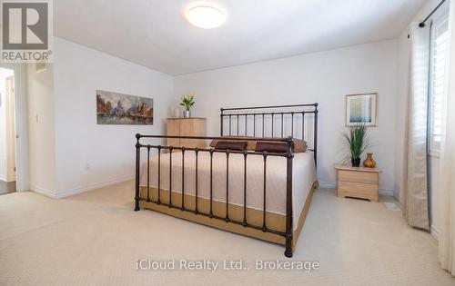 Primary Bedroom With W/I Closet & Ensuite Bathroom - 954 Penson Crescent, Milton, ON - Indoor Photo Showing Other Room