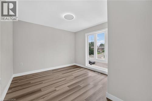 Empty room - 325 Queensdale Avenue E, Hamilton, ON - Indoor Photo Showing Other Room