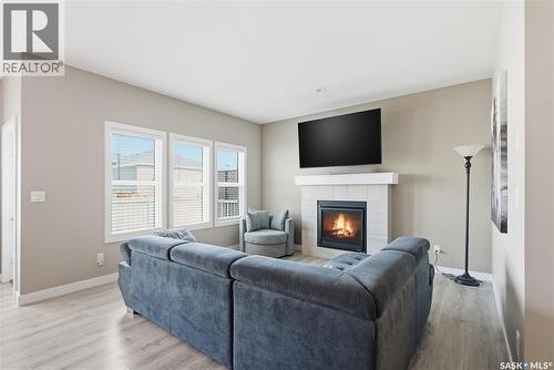 118 Stromberg Crescent, Saskatoon, SK - Indoor Photo Showing Living Room With Fireplace