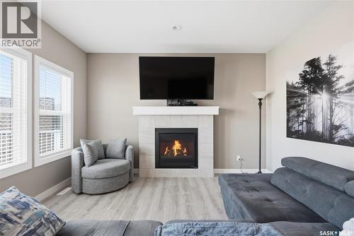118 Stromberg Crescent, Saskatoon, SK - Indoor Photo Showing Living Room With Fireplace
