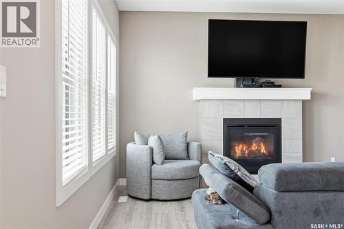 118 Stromberg Crescent, Saskatoon, SK - Indoor Photo Showing Living Room With Fireplace