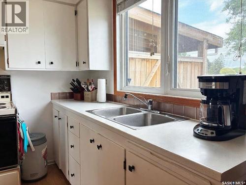 4324 3Rd Avenue N, Regina, SK - Indoor Photo Showing Kitchen With Double Sink