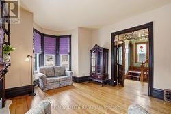 Parlour: Note original gingerbread in archway. - 