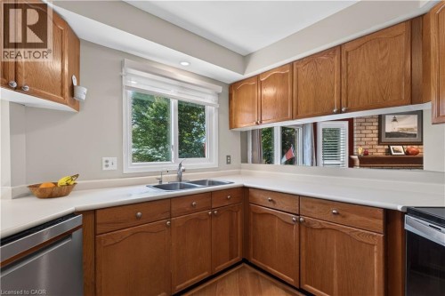 View of backyard - 3194 Tania Crescent, Burlington, ON - Indoor Photo Showing Kitchen With Double Sink