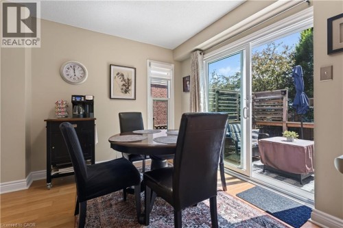 Dining area off kitchen with patio door to back deck - 3194 Tania Crescent, Burlington, ON - Indoor Photo Showing Dining Room