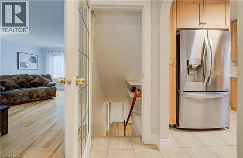 to basement staircase to recreation room - 76 Brentwood Avenue, Kitchener, ON - Indoor