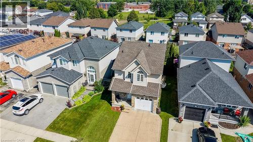 Two-story residence featuring a gabled roofline and a neutral exterior facade - 496 Langlaw Drive, Cambridge, ON - Outdoor
