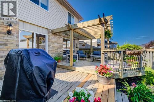 Multi-level wooden deck featuring a slatted pergola structure - 496 Langlaw Drive, Cambridge, ON - Outdoor With Deck Patio Veranda