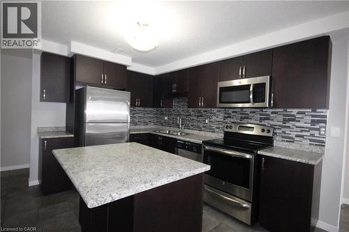 235 RACHEL Crescent Unit# C , Kitchener, Ontario N2R 0E2 3