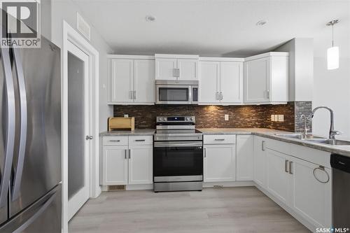 4845 Liberty Street, Regina, SK - Indoor Photo Showing Kitchen With Double Sink