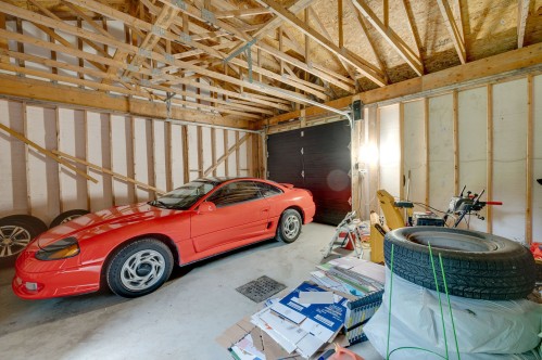 Garage - 110 Rue Philipon, Saint-Calixte, QC - Indoor Photo Showing Garage