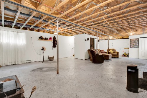Sous-sol - 130 Rue Philipon, Saint-Calixte, QC - Indoor Photo Showing Basement