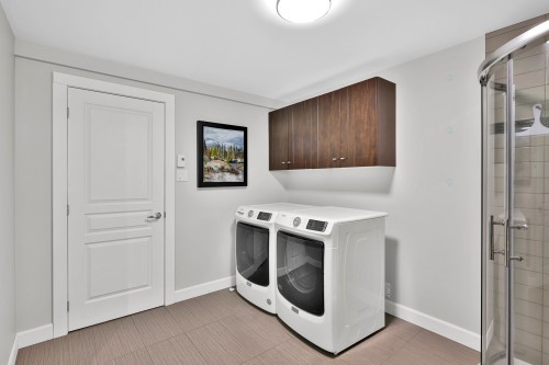 Salle de lavage - 310 Ch. De Brébeuf, Mont-Tremblant, QC - Indoor Photo Showing Laundry Room