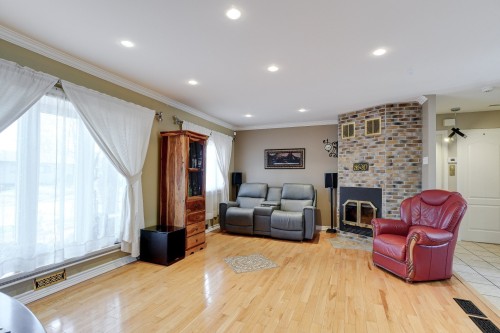 Salon - 148 Rue Cherrier, Repentigny (Repentigny), QC - Indoor With Fireplace