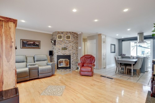 Salon - 148 Rue Cherrier, Repentigny (Repentigny), QC - Indoor Photo Showing Living Room With Fireplace