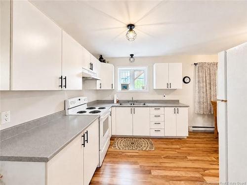 527 St Anne Rd, Bathurst, NB - Indoor Photo Showing Kitchen With Double Sink