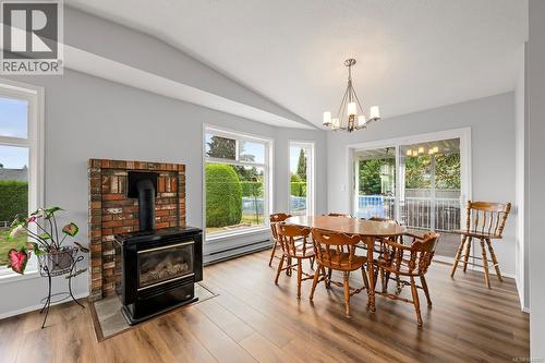 2233 6Th St E, Courtenay, BC - Indoor Photo Showing Dining Room With Fireplace