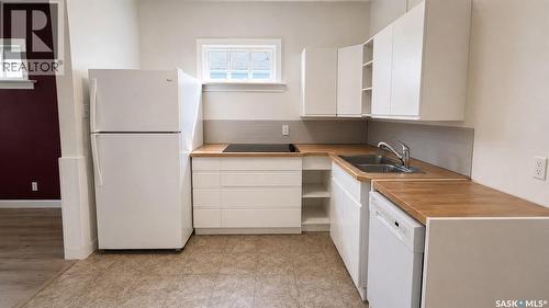 413 L Avenue N, Saskatoon, SK - Indoor Photo Showing Kitchen With Double Sink