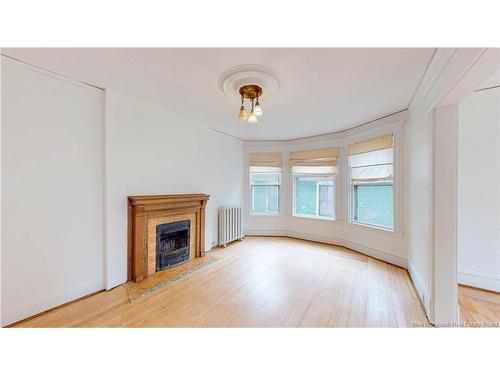 69-71 Clarendon, Saint John, NB - Indoor Photo Showing Living Room With Fireplace