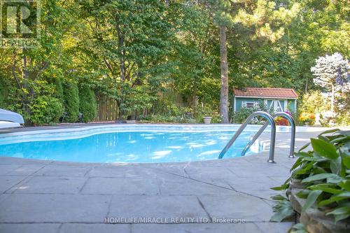 2023 Jacamar Court, Mississauga, ON - Outdoor With In Ground Pool