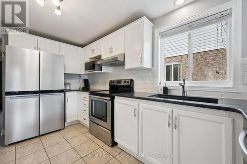 217 Deerpath Drive, Guelph (Willow West/Sugarbush/West Acres), ON - Indoor Photo Showing Kitchen With Double Sink