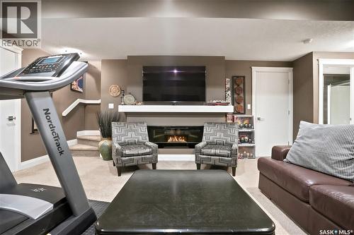 5413 Green Silverberry Drive E, Regina, SK - Indoor Photo Showing Other Room With Fireplace
