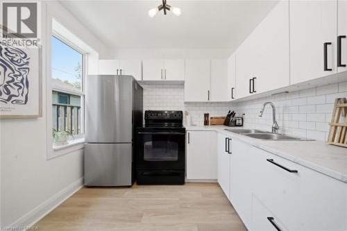 8 Russell Street, Brantford, ON - Indoor Photo Showing Kitchen With Double Sink