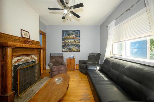 207 Hill Street, Winnipeg, MB - Indoor Photo Showing Living Room With Fireplace