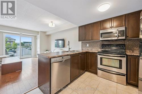 212 - 37 Goodwin Drive, Guelph (Pineridge/Westminster Woods), ON - Indoor Photo Showing Kitchen With Double Sink