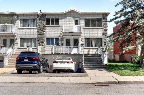 Front of Structure - 9717 Rue Jeannette, Montréal (Lasalle), QC - Outdoor With Balcony With Facade