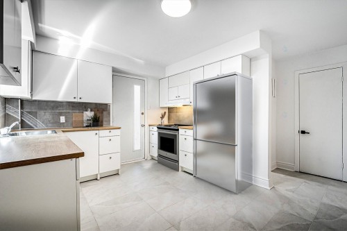 Cuisine - 3-41 Rue René-Philippe, Longueuil (Le Vieux-Longueuil), QC - Indoor Photo Showing Kitchen With Double Sink
