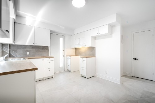 Cuisine - 3-41 Rue René-Philippe, Longueuil (Le Vieux-Longueuil), QC - Indoor Photo Showing Kitchen With Double Sink