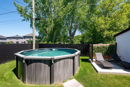 Piscine - 17 Place De La Rive, Saint-Mathieu, QC - Outdoor With Above Ground Pool