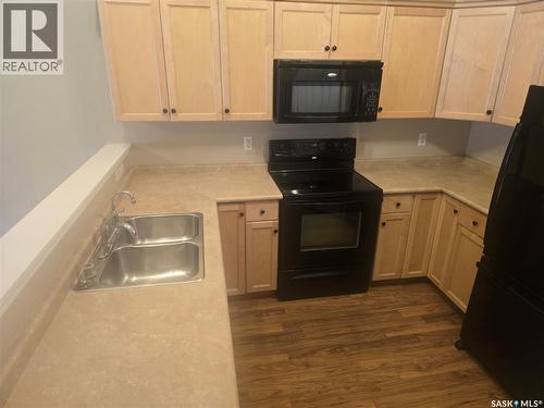 53 4425 Nicurity Drive, Regina, SK - Indoor Photo Showing Kitchen With Double Sink