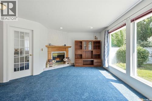 502 Scissons Crescent, Saskatoon, SK - Indoor With Fireplace