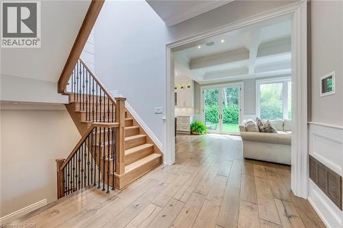 Hardwood flooring throughout the main level - 436 Willis Drive, Oakville, ON - Indoor Photo Showing Other Room