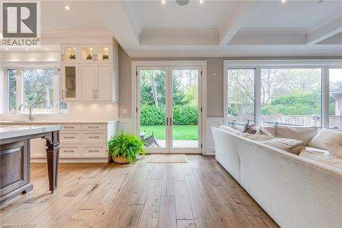 Open-concept living space featuring wood-finish flooring and ample natural light - 436 Willis Drive, Oakville, ON - Indoor Photo Showing Kitchen With Upgraded Kitchen