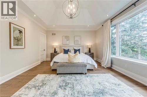 Vaulted ceiling with an ornate chandelier - 436 Willis Drive, Oakville, ON - Indoor Photo Showing Bedroom