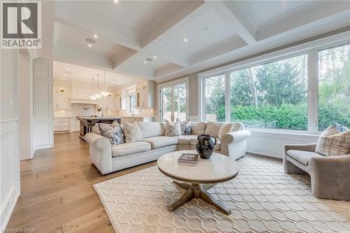 Open-concept living area with coffered ceilings and wood-finish flooring - 436 Willis Drive, Oakville, ON - Indoor Photo Showing Living Room