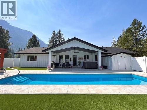 1217 Mcphee Road, Castlegar, BC - Outdoor With In Ground Pool With Deck Patio Veranda With Backyard
