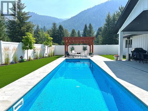 1217 Mcphee Road, Castlegar, BC - Outdoor With In Ground Pool With Backyard