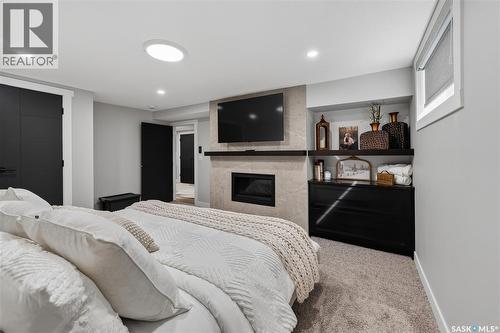 3603 Selinger Crescent, Regina, SK - Indoor Photo Showing Bedroom With Fireplace