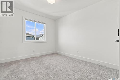 115 Rosewood Boulevard E, Saskatoon, SK - Indoor Photo Showing Other Room