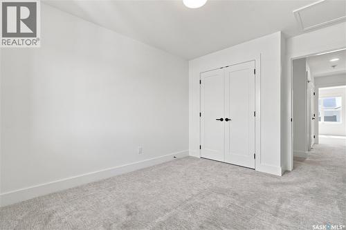 115 Rosewood Boulevard E, Saskatoon, SK - Indoor Photo Showing Other Room