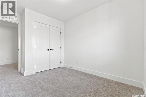 115 Rosewood Boulevard E, Saskatoon, SK - Indoor Photo Showing Other Room