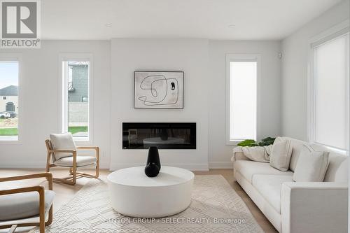 275 Silver Maple Circle, Thames Centre, ON - Indoor Photo Showing Living Room With Fireplace