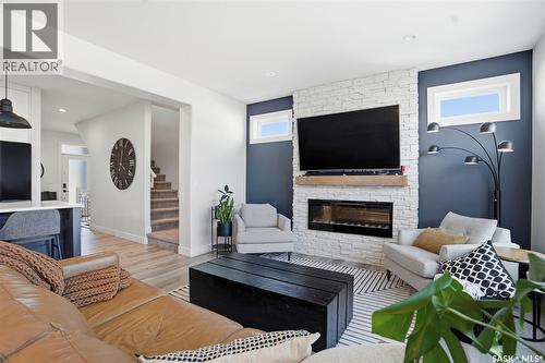 250 Skopik Crescent, Saskatoon, SK - Indoor Photo Showing Living Room With Fireplace
